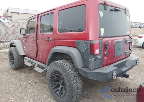2011 Jeep Wrangler Unlimited Sahara z USA, uszkodzony, nr VIN 1J4BA5H11BL577325